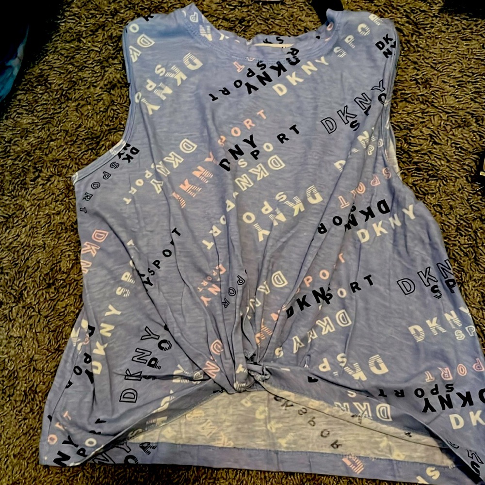 This shirt is blue black pink and white it’s a large (12)